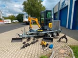 Mini excavator BK1250KSR on trailer with accessories
