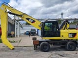 2011 Caterpillar M318D MH Material Handler