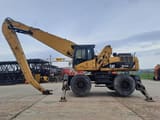 2009 Caterpillar M325D LMH Material Handler