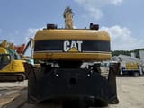 2005 Caterpillar M325C Material Handler
