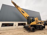 2008 Caterpillar 325D Material Handler