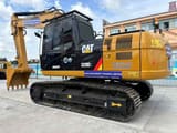 2024 Caterpillar 320D2 crawler excavator, rear three-quarter view