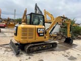 2022 Caterpillar 306E mini excavator, rear three-quarter view