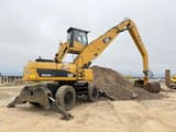 2010 Caterpillar 325DL Wheel Excavator