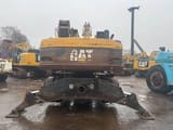 2005 Caterpillar M322C Material Handler