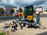 Berger Kraus BK1250KSR mini excavator on a trailer with accessories