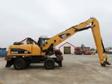 2008 Caterpillar M322D Material Handler