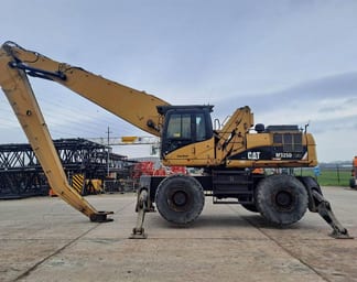 2009 Caterpillar M325D LMH Material Handler