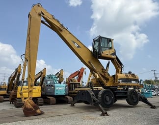 2005 Caterpillar M325C Material Handler