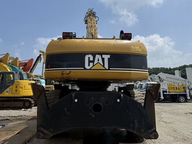 2005 Caterpillar M325C Material Handler