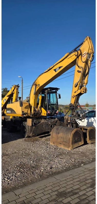2006 Caterpillar M318CMH Wheel Excavator