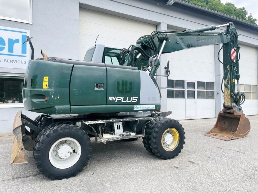 2009 New Holland MH-PLUS Wheel Excavator