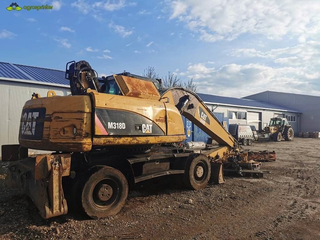 2008 Caterpillar M318D Material Handler