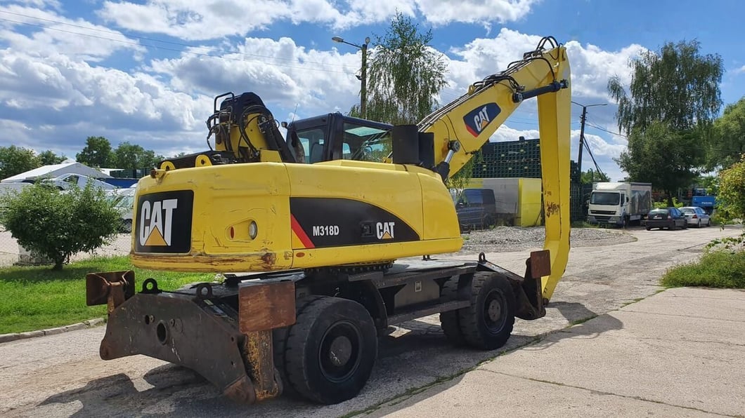2011 Caterpillar M318D MH Material Handler