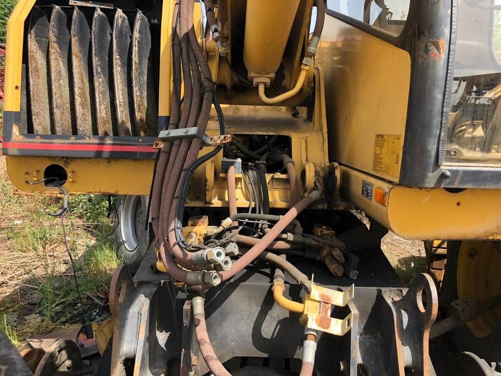 1999 Caterpillar M312 Wheel Excavator