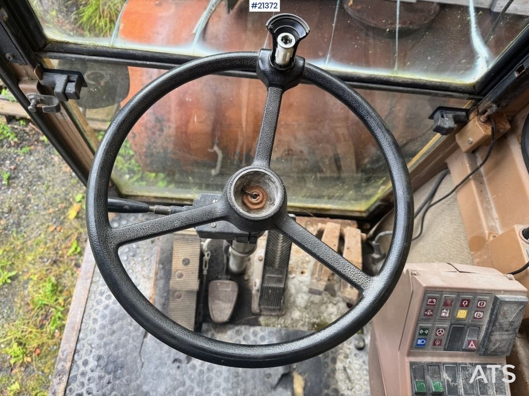 1994 Caterpillar 212B Wheel Excavator