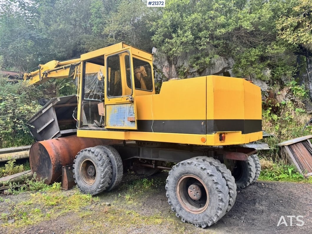 1994 Caterpillar 212B Wheel Excavator