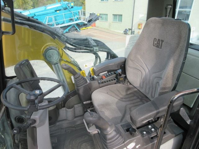 2009 Caterpillar M313D Material Handler