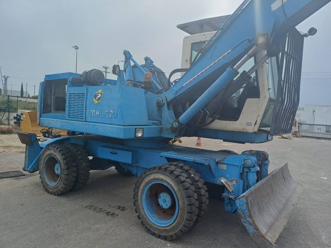 2003 Fuchs MHL320 Wheel Excavator