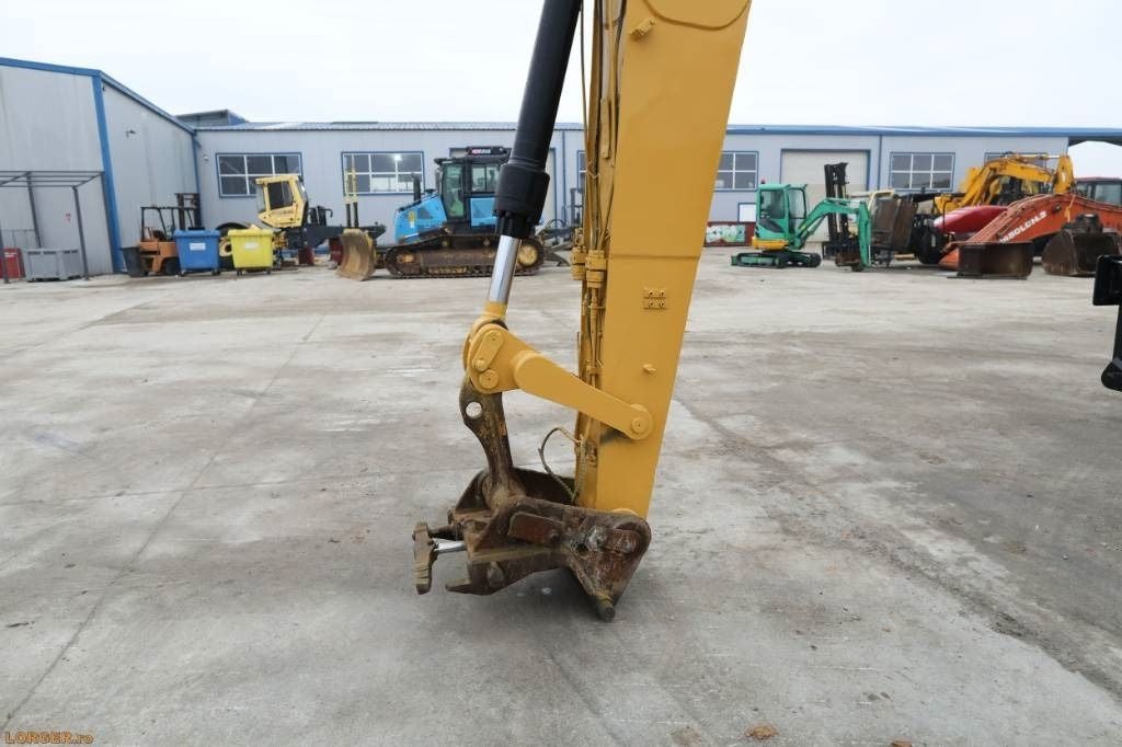 2008 Caterpillar M322D Material Handler