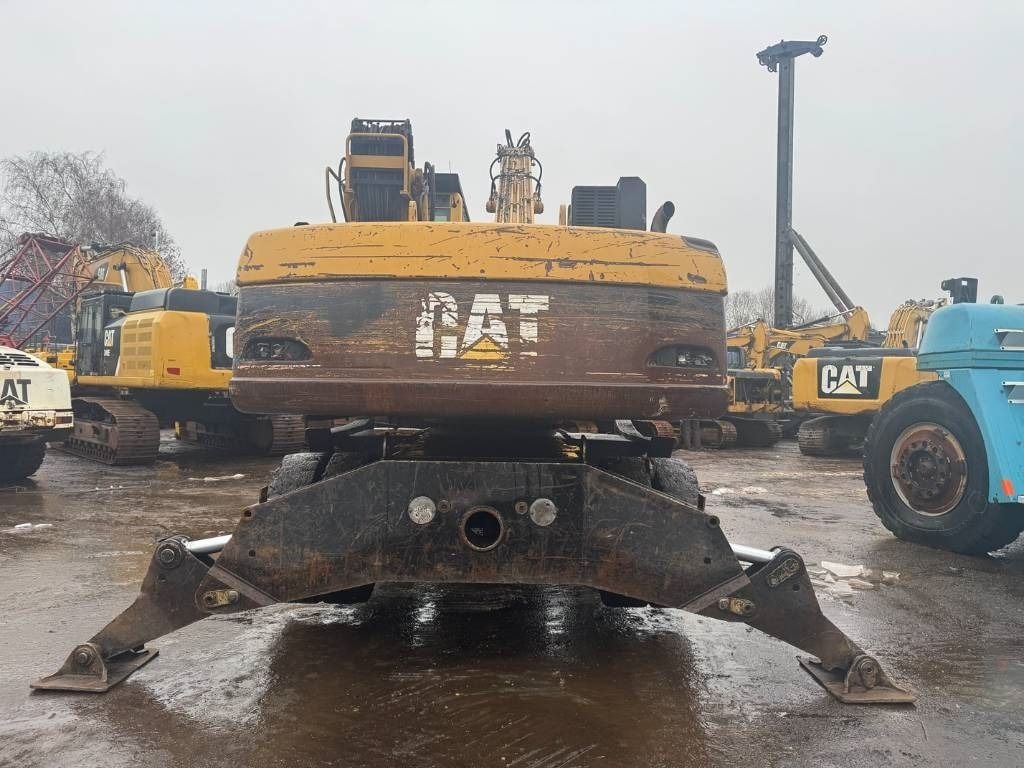 2005 Caterpillar M322C Material Handler