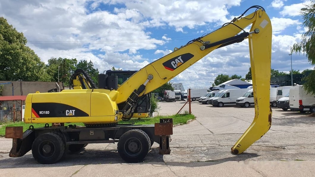2011 Caterpillar M318D MH Material Handler