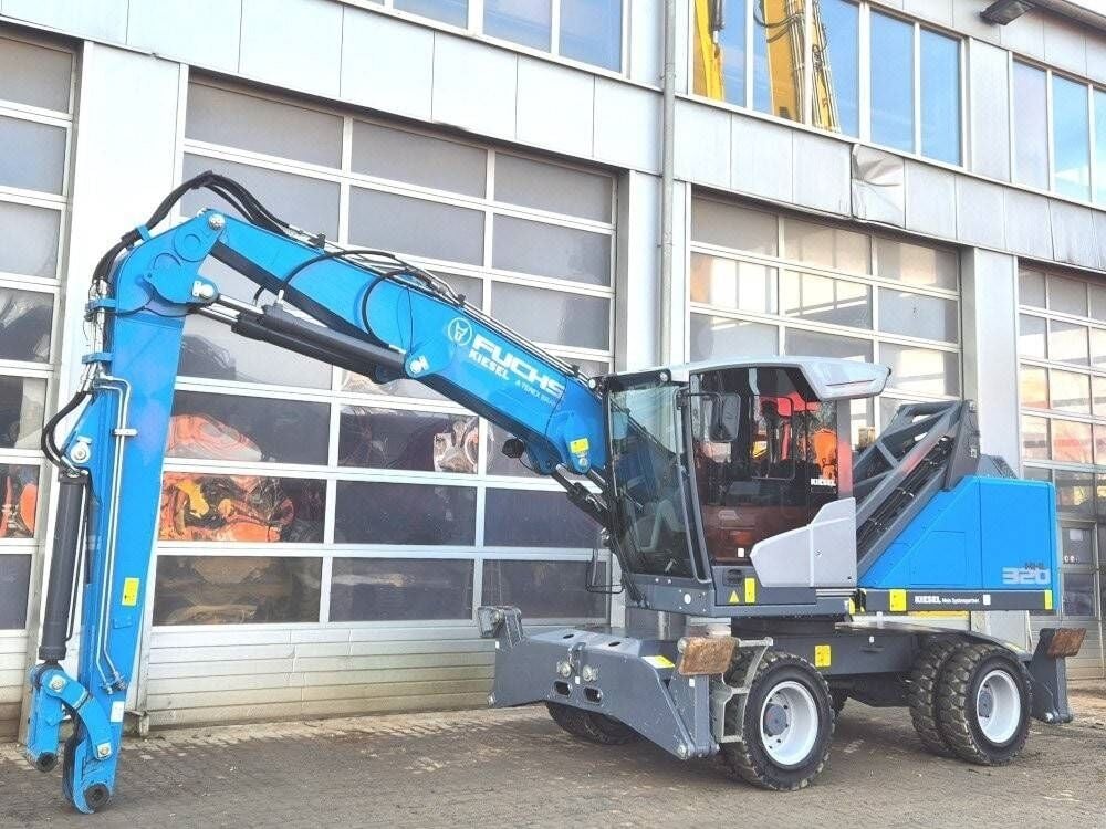 2023 Fuchs MHL320F Material Handler