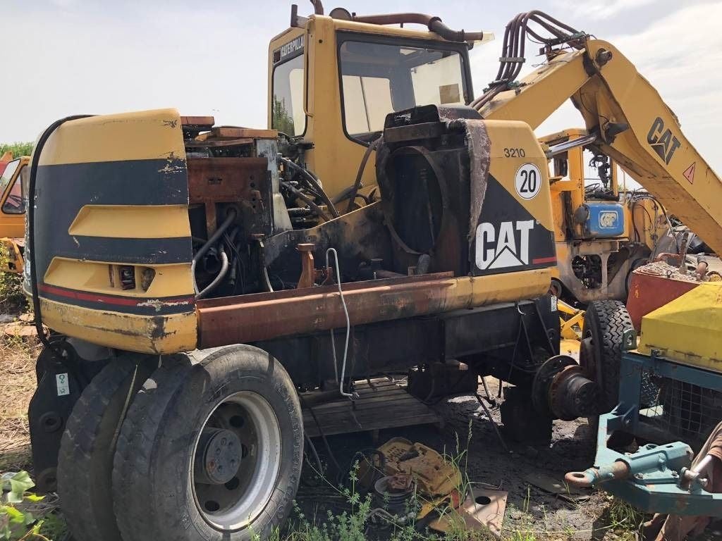 1999 Caterpillar M312 Wheel Excavator