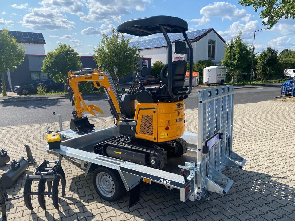 Berger Kraus BK1300JSR mini excavator on trailer, rear three-quarter view