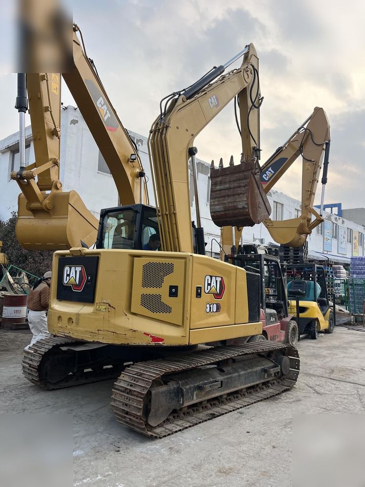 2019 Caterpillar 310 Гусеничний екскаватор