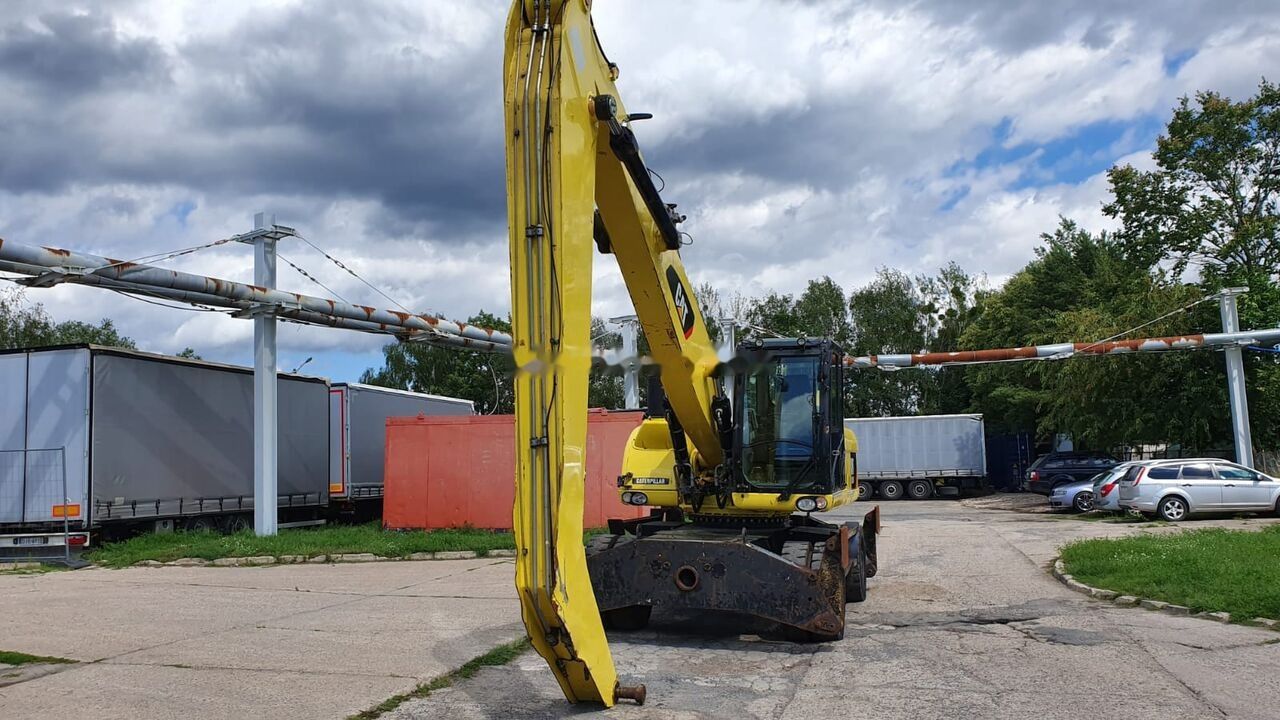 2011 Caterpillar M318D MH Material Handler