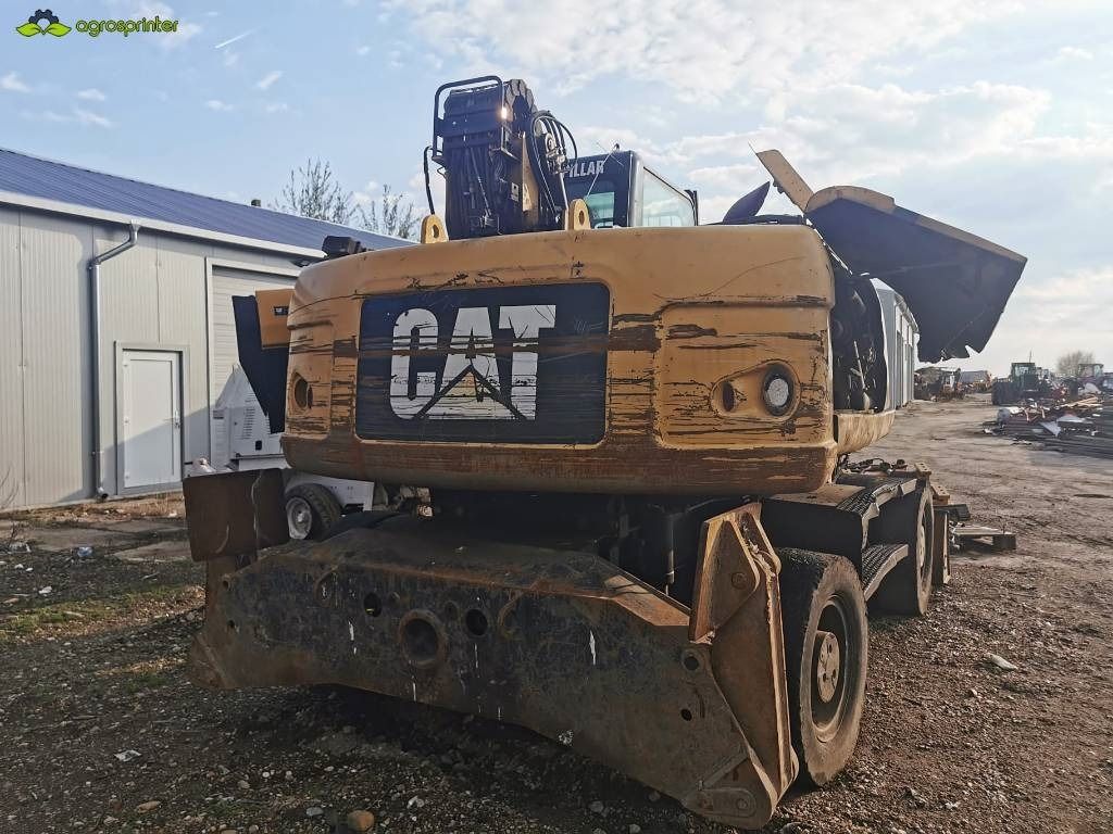 2008 Caterpillar M318D Material Handler