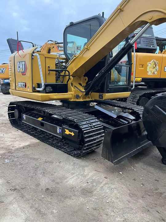 2024 Caterpillar 307E2 2024 Caterpillar 307E2 excavator, rear three-quarter view