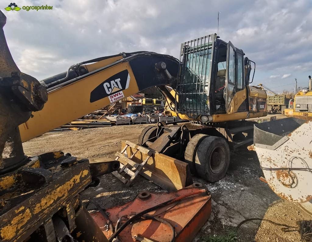 2008 Caterpillar M318D Material Handler