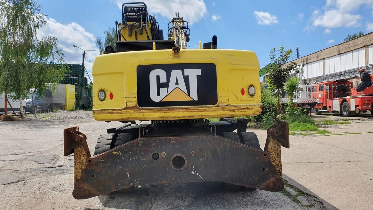 2011 Caterpillar M318D MH Material Handler
