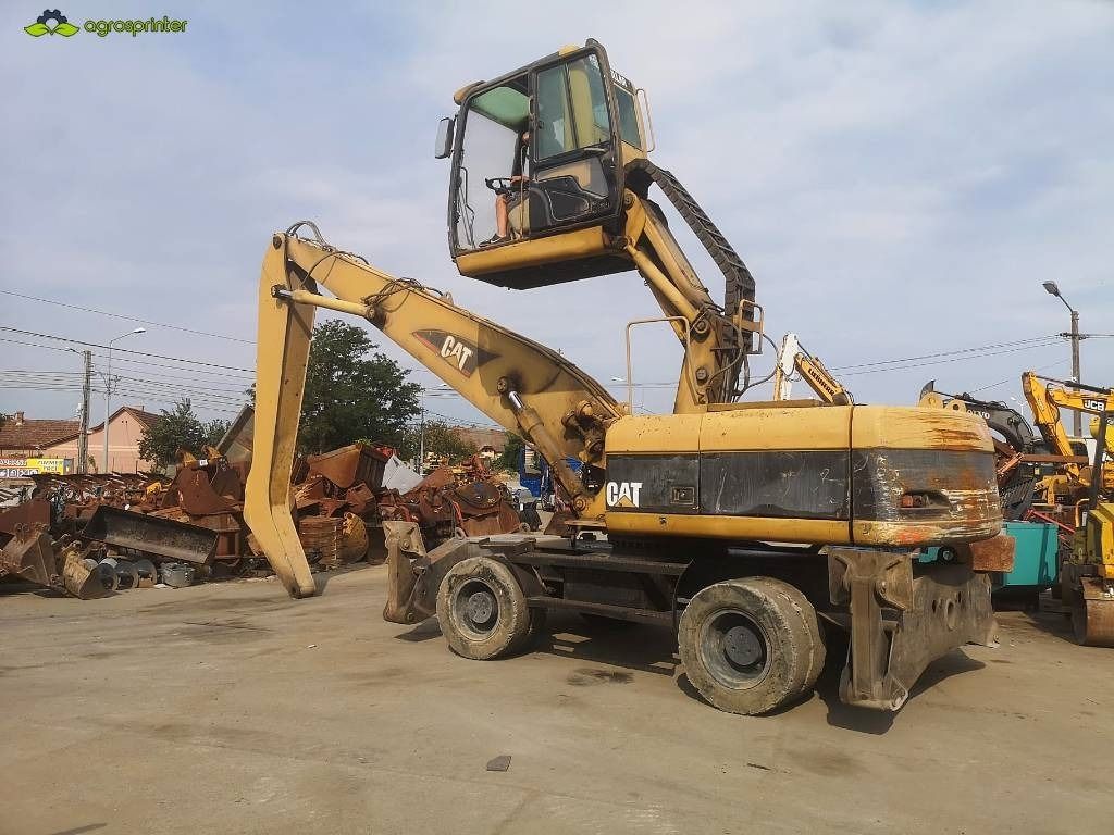 2005 Caterpillar M322C MH Material Handler