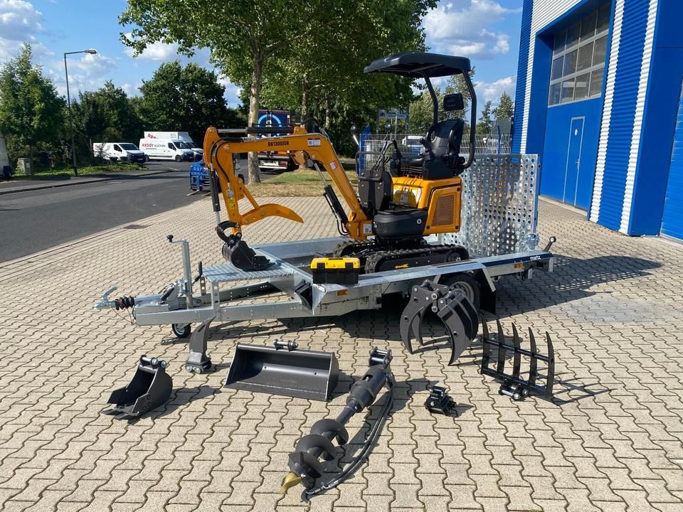 Berger Kraus BK1300JSR mini excavator on trailer with attachments