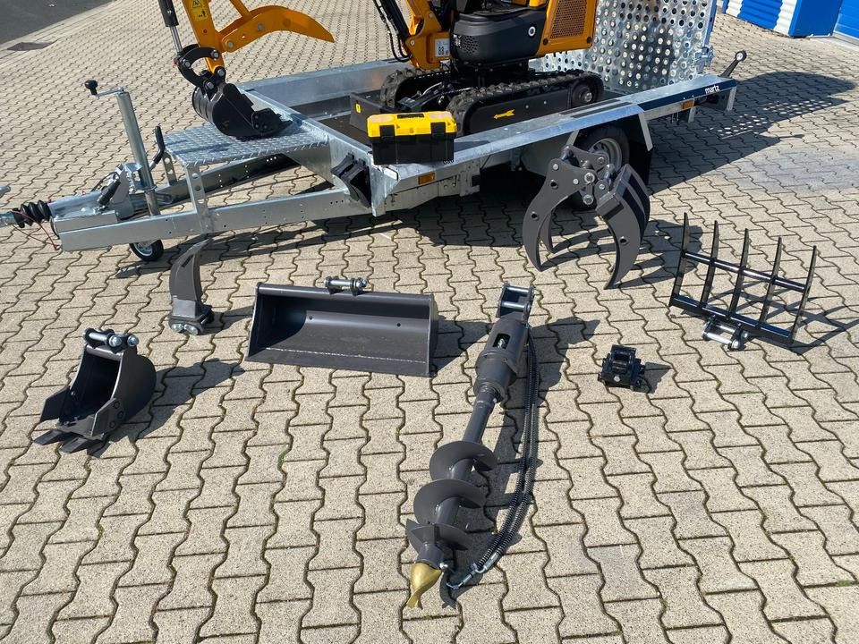 Berger Kraus BK1300JSR mini excavator on trailer with attachments