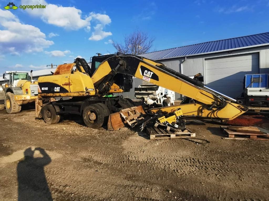 2008 Caterpillar M318D Material Handler