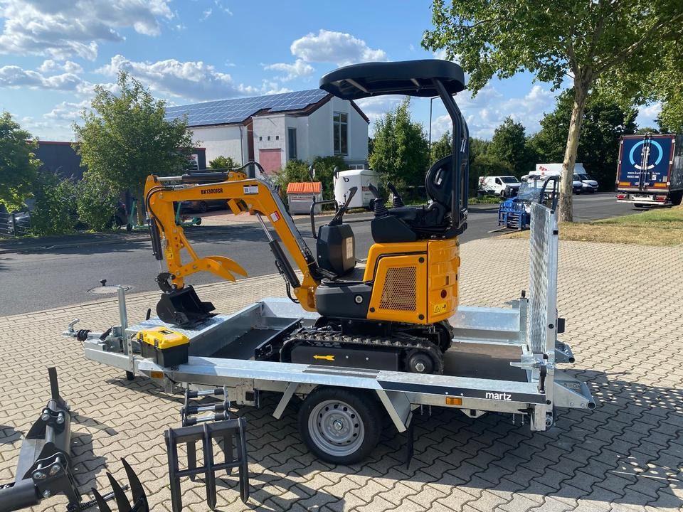 Berger Kraus BK1300JSR mini excavator on a trailer, side view