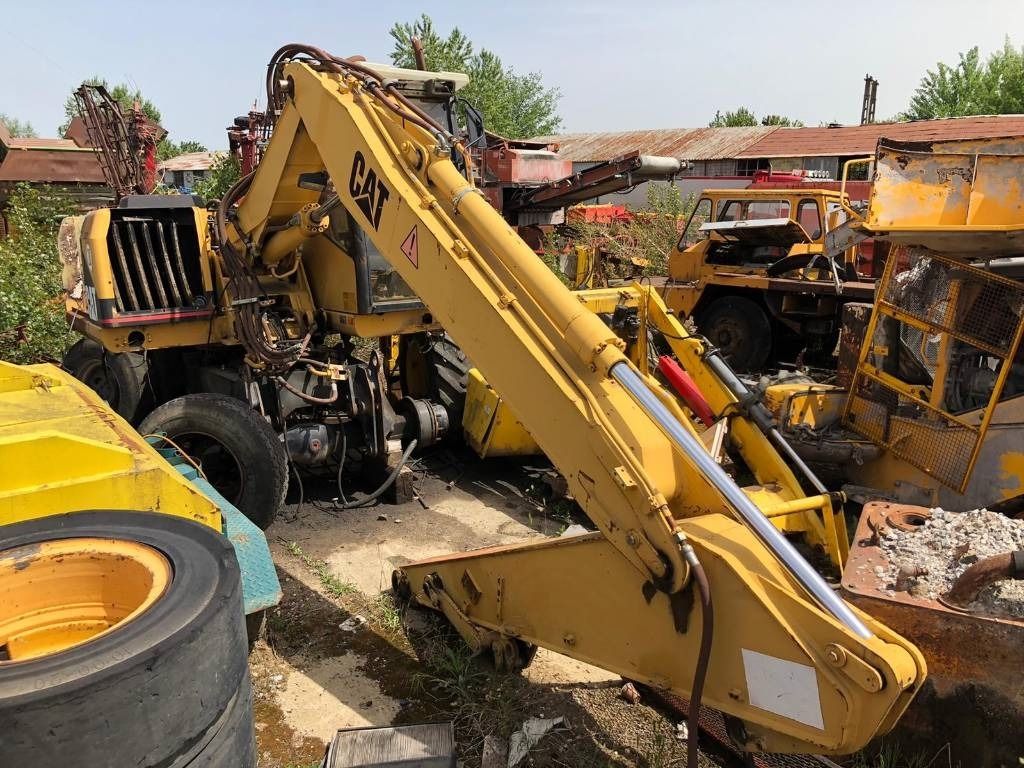 1999 Caterpillar M312 Wheel Excavator