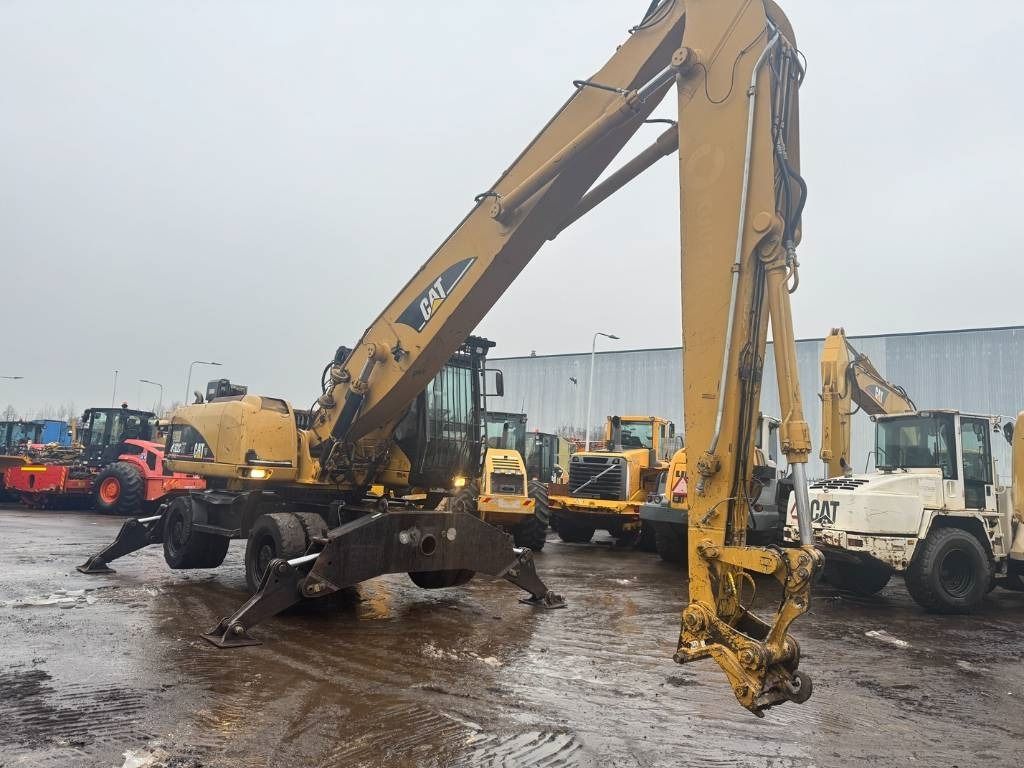 2005 Caterpillar M322C Material Handler