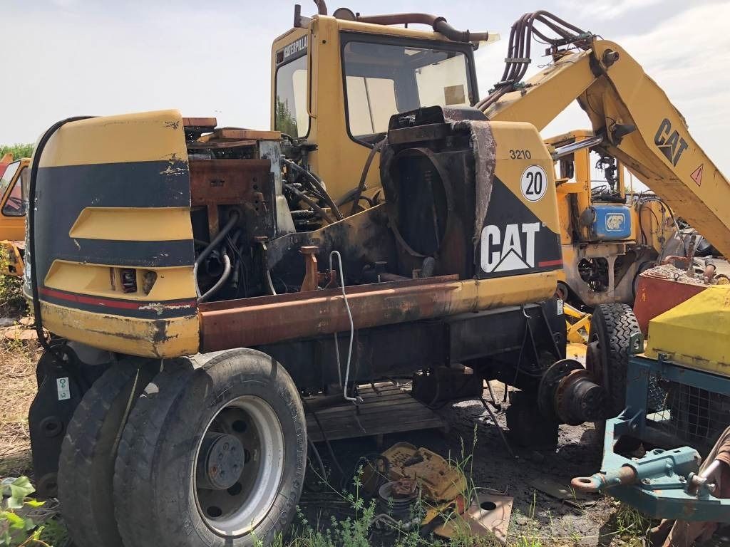 1999 Caterpillar M312 Wheel Excavator