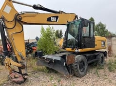 2012 Caterpillar M322D Колісний екскаватор
