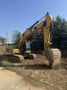 2012 Caterpillar 323DL Гусеничный экскаватор