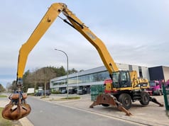 2011 Caterpillar 325D Przeładowarka do materiałów