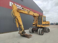 1992 Caterpillar 214 B Wielgraafmachine
