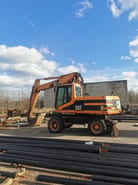 Excavator pe roți Caterpillar M318, 2001