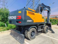 Excavadora de ruedas Hyundai 210 de 2022
