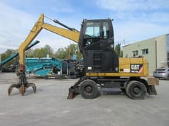 2009 Caterpillar M313D Material Handler